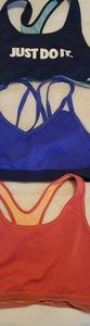 3 Nike Sport bras
